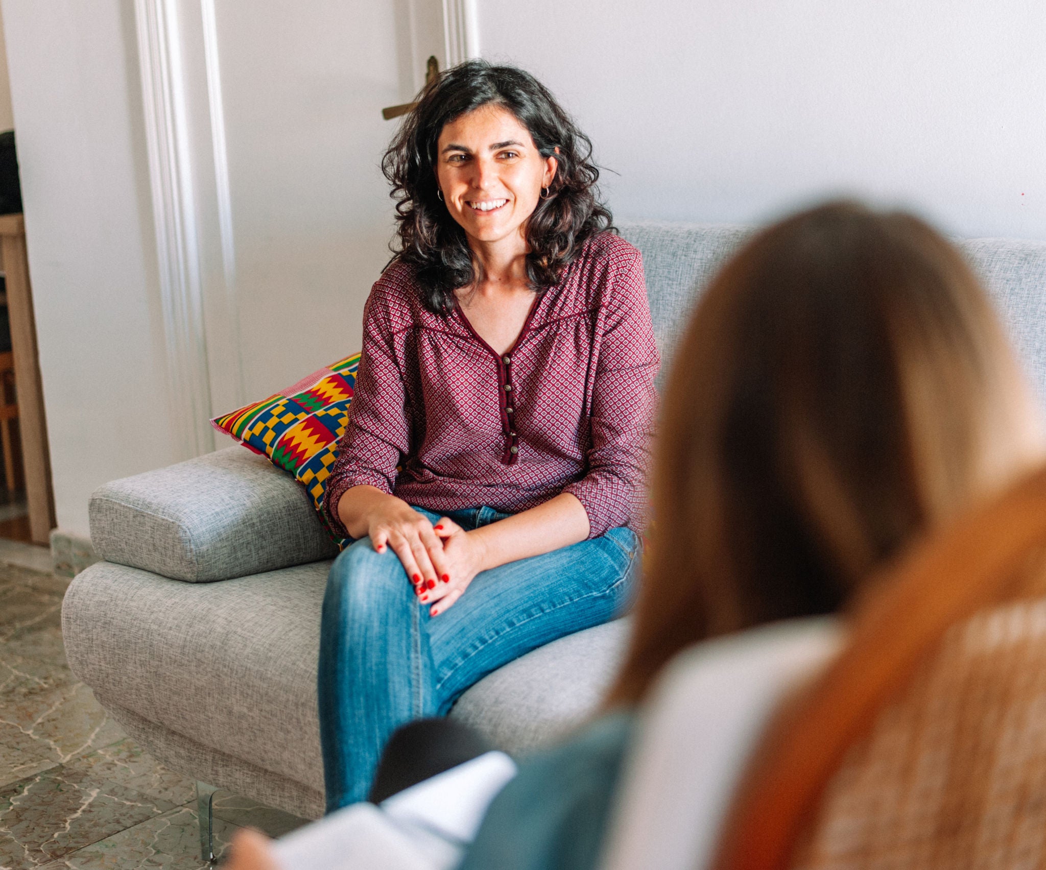 psychology and mental therapy concept - spanish woman patient and psychologist at psychotherapy session