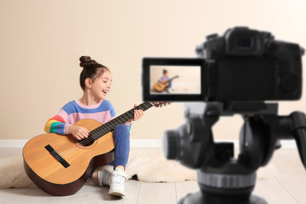 Girl playing with guitar